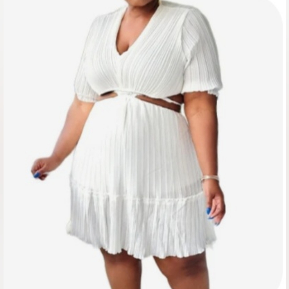 Cute white cut-out dress. Perfect for all white party, vacay, or summer outing.